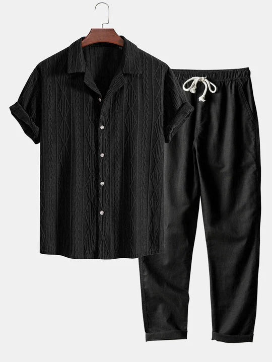 GEOMETRIC JACQUARD CUBAN-STYLE SHIRT AND STRAIGHT-CUT LINEN TROUSERS.